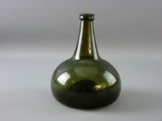 AN 18th CENTURY GREEN GLASS ONION SHAPED WINE BOTTLE having a string ring collar and deep snapped