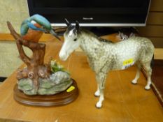 Beswick model of a dappled horse and a porcelain model of a kingfisher on a wooden stand