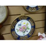 Pair of fine quality Bavarian porcelain blue and gilt bordered floral plates