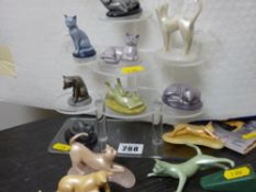 Twelve gemstone collection miniature model cats on a perspex display stand