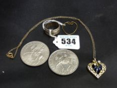 Heart shaped pendant and one other, a wide band silver signet ring and two 1977 Coronation crowns