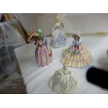 Two Royal Doulton china figurines 'Daydreams' and 'Miss Demure' and a Royal Worcester china figurine