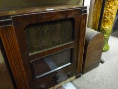 Wood encased Marconi valve radio and a Singer hand sewing machine in a case