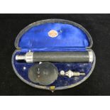 Cased ophthalmoscope by Alexander & Fowler