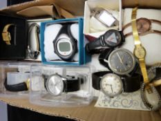 Box of various wristwatches