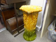 Staffs (probably Bretby) two tone floral decorated pedestal style stick/umbrella pot, 22 cms high