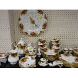 Good large parcel of Royal Albert 'Old Country Roses' tea and breakfast ware and a wall clock etc