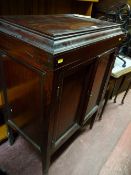 Mahogany stained two door cupboard