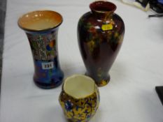 Coalport blue and gilt small vase, a Wilkinsons lustre and fruit trumpet vase and a Regal ware