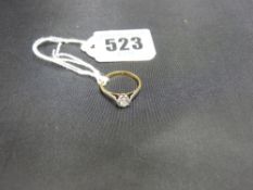 Eighteen carat gold and platinum diamond solitaire ring, visual estimate 0.4 carat, 2 grms total,