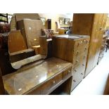 A vintage polished bedroom suite comprising double wardrobe, chest of four long & two short