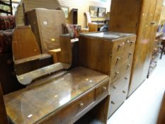 A vintage polished bedroom suite comprising double wardrobe, chest of four long & two short