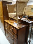 A Victorian chest of three long & two short drawers together with a wicker bedroom chair