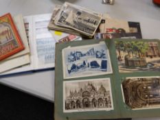 A parcel of philatelic material including postcards & loose stamps