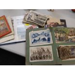 A parcel of philatelic material including postcards & loose stamps