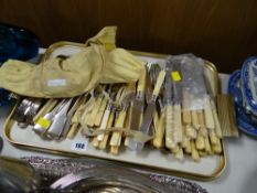 A tray of various flatware