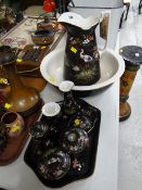 A suite of Staffordshire pottery dressing table items decorated in a Japanese crane pattern