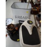 A vintage enamel bread bin, a vintage set of bathroom scales, coffee mill etc