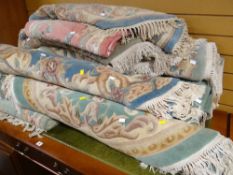 A parcel of Chinese washed rugs in various colours & sizes