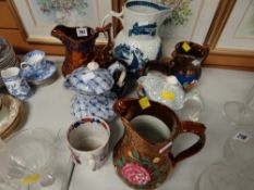 Parcel of vintage Staffordshire & other jugs including a face jug, lustre jugs, Masons beaker etc