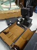 A vintage Kodak projector, screen etc