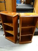 A pair of reproduction mahogany effect narrow bookcases