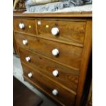 A Victorian mahogany chest of three long & two short drawers with ceramic knobs