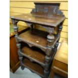 A turn of the century carved oak open dumbwaiter