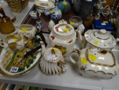 A vintage Sadler three-piece flower decorated teaset, two other Sadler teapots, storage jar etc