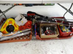 A quantity of mixed items removed from a garage including golf clubs, electrical items, old Avometer