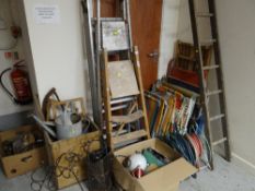 The garage contents from a Swansea house clearance including retro deck chairs & boxes of general