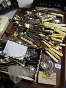 A tray of various flatware