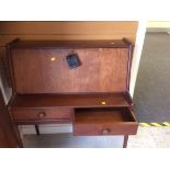 A vintage teak wood compact two-drawer bureau by A.Younger Ltd