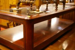 Modern mahogany effect glass topped coffee table