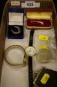 Two Limit wristwatches, small vintage purse, cased gent's tie clip etc