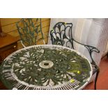 Cast metal garden table and two chairs