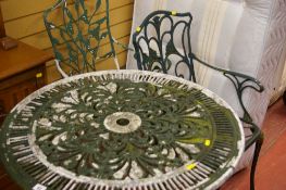 Cast metal garden table and two chairs