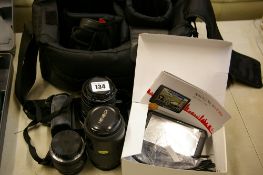 Minolta Dynax 7000I camera, Sigma lens and a Minolta lens with carry cases etc