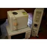 Daewoo breadmaker, Delonghi heater and a white coloured microwave oven E/T