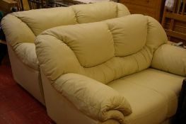 Cream leather effect lounge suite of three and two seater settees