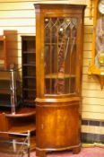 Quality serpentine front glass top standing corner cabinet