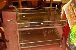 Art Deco chrome and glass two tier tea trolley and a vintage oak two tier trolley