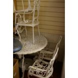Cast metal garden table and four chairs