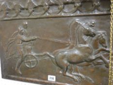 Metallic plaque depicting chariots