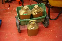 Scotts wheeled lawn seeder and three tubs of Cuprinol weather protection fluid