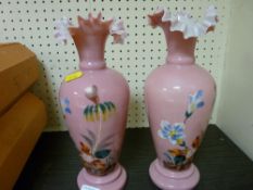 Pair of pink milk glass floral decorated vases