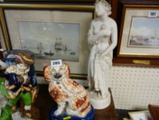 Staffs dog on a cobalt blue base and a classical lady parian porcelain figure