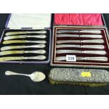 Two cased silver handled butter knives sets, silver jam spoon etc