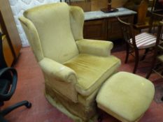 Classical reproduction wingback armchair with matching footstool