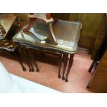 Nest of three reproduction coffee tables with glass tops